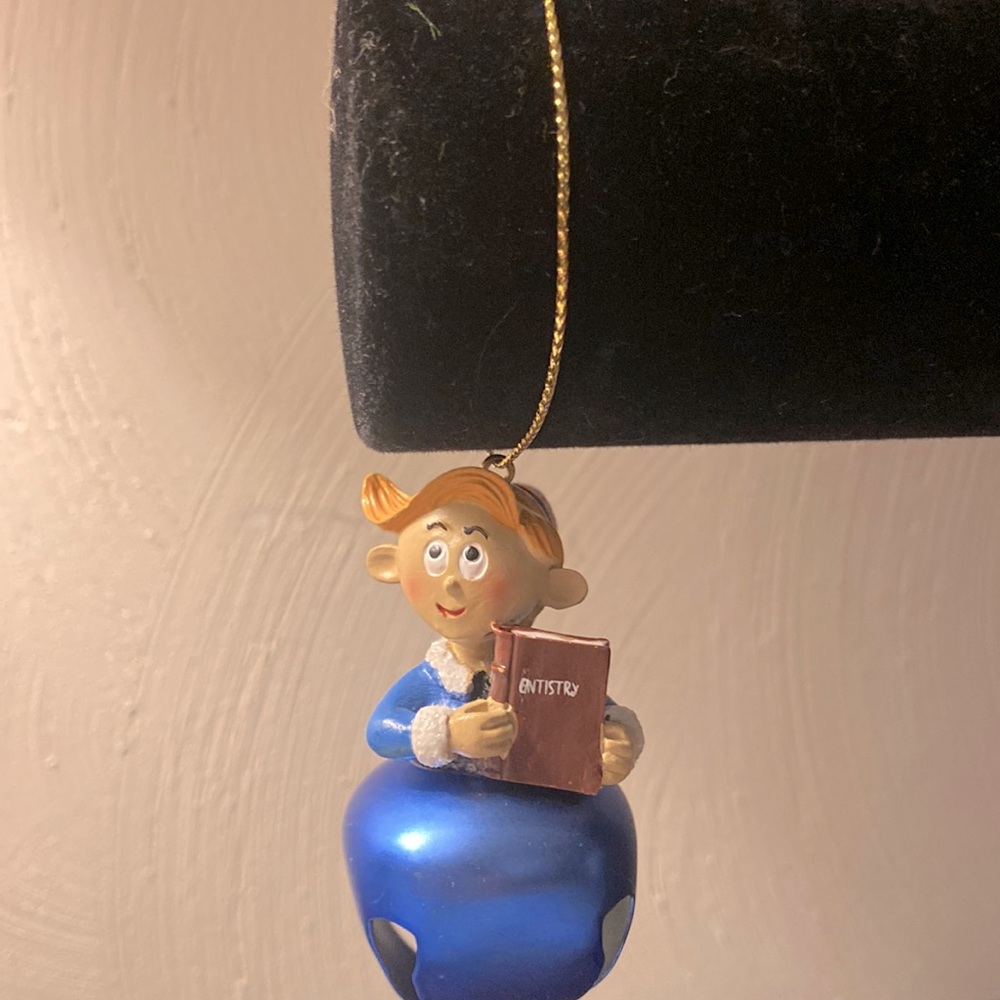 Hermey the Elf on a blue bell Ornament